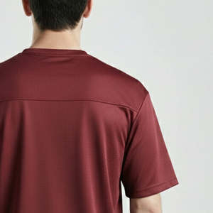 เสื้อฟุตบอลเยาวชนทรงโอเวอร์ไซส์สีแดงเลือดหมู รุ่น 'All Jersey' ปี 2026 ผ้าโพลีเอสเตอร์พิมพ์ลายแบบ Sublimation พร้อมกางเกงขาสั้น ชุดกีฬา - Product Image 4
