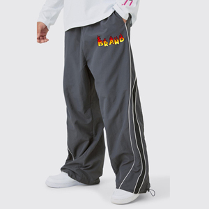 Vente en gros 100% pantalons pour hommes en nylon lavé sur mesure pantalons de survêtement baggy à jambes larges avec bandes latérales pantalon pour homme à taille élastique de style décontracté - Product Image 6