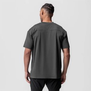 Camiseta de entrenamiento gris de gran tamaño Camiseta de gimnasio de rendimiento Absorbe el sudor, antimicrobiano, camiseta de entrenamiento atlético Boxy Fit de secado rápido - Product Image 3