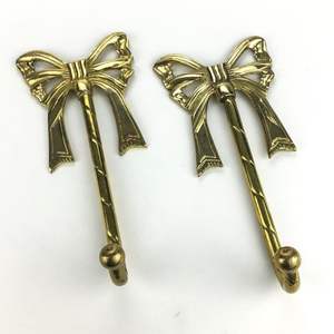 Decorative brass <b>wall</b> <b>hooks</b> for classic traditional interiors enhancing storage and display with elegant craftsmanship appeal - Product Image 3