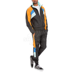 Ensemble coupe-vent décontracté deux pièces avec tissu léger et design favorisant la liberté de mouvement - Product Image 4