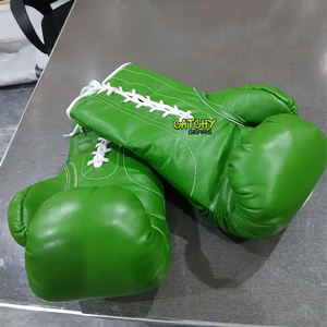 นวมชกมวยหนังพรีเมียมพร้อมสายรัดข้อมือ ดีไซน์ดูดซับแรงกระแทกสำหรับการฝึกซ้อมและการแข่งขัน - Product Image 6