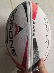 BALÓN DE RUGBY PESADO - DESARROLLADOR DE PASES 1KG - Product Image 1