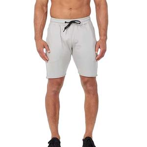 Pantalones cortos deportivos con logotipo personalizado para hombre, ropa de gimnasio, entrenamiento físico, pantalones cortos deportivos para correr con pantalones cortos de compresión interior para hombre - Product Image 1