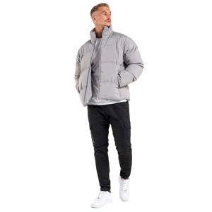 Chaqueta acolchada elegante para hombre con construcción ligera y tela transpirable para comodidad durante todo el día - Product Image 1
