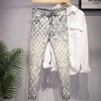 Lot de stock de vêtements excédentaires de marque chinoise populaire et haut de gamme Pantalon en jean pour homme et garçon Prix super bas Marques en surplus de stock Jeans en denim