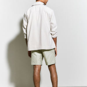 Pantalones cortos de hombre de poliéster de golf informales en blanco de color sólido para entrenamiento que absorbe la humedad de secado rápido con logotipo personalizado - Product Image 5