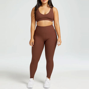 Ropa deportiva para gimnasio para mujer, sujetador y mallas para mujer, conjuntos de Yoga de talla grande con estilo a la moda para exteriores personalizados - Product Image 1