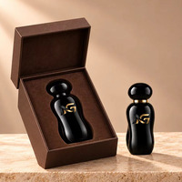 Flacon de parfum en verre de luxe noir mat exclusif de 30 ml, design de contour unique, prend en charge l'emballage personnalisé de flacons de parfum privés