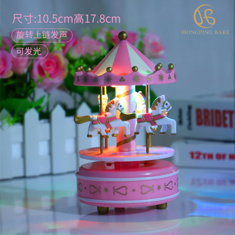 Cheval à bascule rose avec lumières
