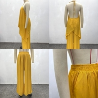 Ensemble deux pièces décontracté et tendance J480 pour femme : haut asymétrique sans manches à col halter et pantalon ample à jambe droite – Collection africaine pour femmes