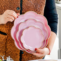 2025 maison Table à manger haut de gamme Snack assiette moderne en plastique de qualité alimentaire léger luxe fruits et scories plat nouveau Os cracher Style
