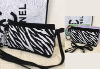 Premium imprimé léopard grande capacité sac de maquillage grande pochette de toilette multifonctionnelle pour les femmes voyage porte-monnaie étui