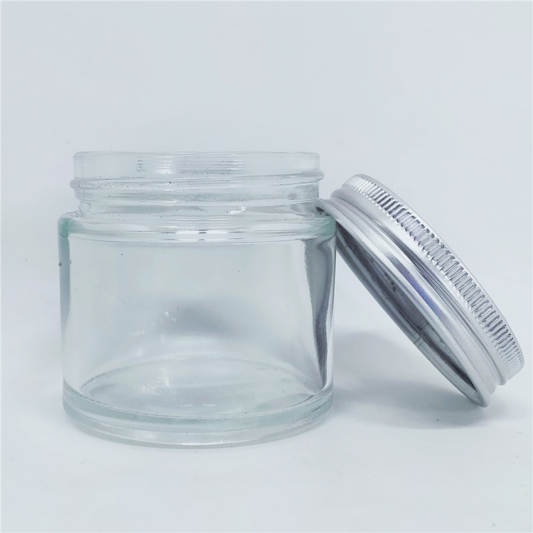 Hot sale Clear cosmetic glass jar 60g with aluminium lid