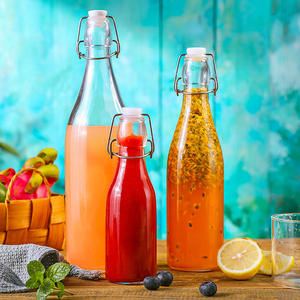 Amazons Venta caliente 2024 personalizado 250ml 500ml 750ml 1000ml botella de bebida con tapa abatible de vidrio - Product Image 6