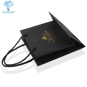 Custom Logo Gold Stamping Printed Luxury Flat Bottom Matte Black Kraft Shopping <b>Gift</b> Paper Bag - Product Image 2