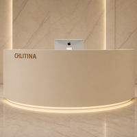 Bureau de réception professionnel personnalisable de luxe avec surface en pierre incurvée circulaire, éclairage LED, style moderne minimaliste pour boutique, magasin ou bureau
