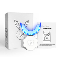 Kit de blanqueamiento dental empaquetado OEM con luz de 28LED recargable aprobado por Ce con uso doméstico de Gel sin peróxido