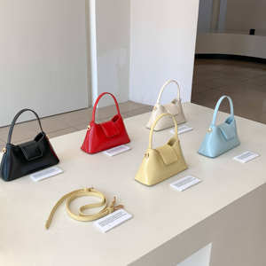 Mini shiny PU leather <b>top</b> handle handbag with double carrying crossbody bag - Product Image 1