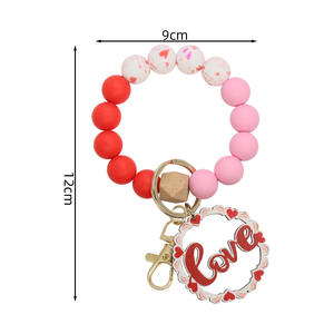 <span class=keywords><strong>Grossiste</strong></span> Bracelet de perles de <span class=keywords><strong>silicone</strong></span> à la mode Porte-clés Saint Valentin en bois personnalisé Porte-clés en bois avec impression UV pour porte-clés en métal - Product Image 4
