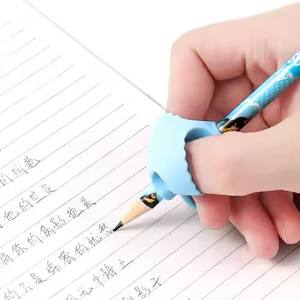 Venta caliente Empuñaduras de lápiz de goma <span class=keywords><strong>Escritura</strong></span> asistida Portalápices para niños Papelería para niños <span class=keywords><strong>Corrector</strong></span> de <span class=keywords><strong>escritura</strong></span> - Product Image 3