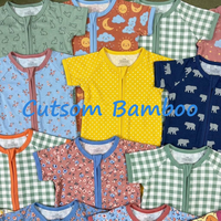 Kouzi OEM – Nouveaux pyjamas bébé en viscose de bambou à faible MOQ, imprimés sur mesure, respirants, hypoallergéniques, avec fermeture éclair bidirectionnelle