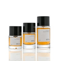 Nouvelle conception de flacon de parfum à bouchon à pression de 30 ml, 50 ml, 100 ml, flacon de parfum rond en verre avec bouchon noir