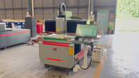 Centre d'usinage CNC 6090 le plus vendu avec table sous vide en aluminium, réservoir d'eau et système NC Studio