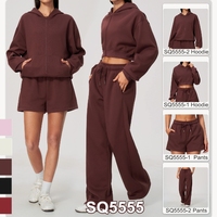 Ensemble de survêtements personnalisés avec logo pour femme, collection automne-hiver, comprenant un sweat à capuche et un pantalon de jogging en coton, idéal pour le sport et le fitness SQ5555