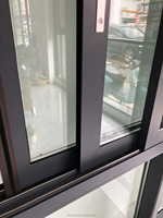 Ventana Corredera de Aluminio de Alta Resistencia con Mosquitera Integrada y Cierre Multipunto de Seguridad para Unidades Residenciales en Planta Baja