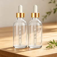 Flacon compte-gouttes en verre multi-tailles en gros, impression sérigraphique personnalisée, couvercle en métal électroplaqué et bambou pour sérum de soin et huile essentielle