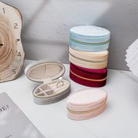 Boîte à bijoux ovale de luxe en velours avec fermeture éclair, mini sac de rangement portable pour bagues et boucles d'oreilles, idéal pour les voyages