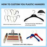 Cintres en plastique noir bon marché du fabricant avec barre transversale détachable et pince inférieure, logo couleur personnalisé