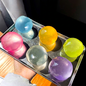 Balle anti-stress en silicone TPE remplie d'huile de coco, série White Moonlight, QICHONG MYUTLUOO, unisexe, à partir de 2 ans - Product Image 1