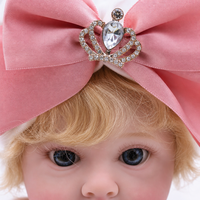 Poupée Reborn de 22 pouces en vinyle intégral, avec nœud rose, couronne, robe grise et jupe en tulle, pour jeu d'imitation