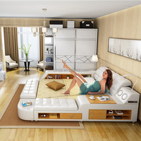 Lit multifonctionnel de style américain Espace de rangement pour la musique moderne Lit en cuir Lit de luxe à lumière LED avec table élévatrice pour ordinateur