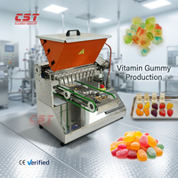 Machine automatique de fabrication de gommes de suppléments vitaminiques CST, en acier inoxydable SUS304, avec déposeur contrôlé par PLC, certifiée CE FDA, pour usine.
