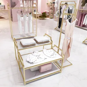 Benutzer definierte Bekleidungs geschäft Boutique Display Stand Edelstahl Shiny Gold Kleider ständer für Bekleidungs geschäfte