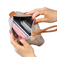 Dompet Clutch Kulit Sapi Asli Dua Warna Kontras dengan Tali Pergelangan Tangan dan Ritsleting Atas untuk Wanita