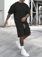 Conjunto de camiseta y pantalones cortos de algodón negro para hombre, cuello redondo, manga corta, color sólido, transpirable.