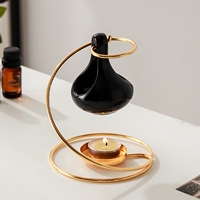 Diffuseur d'arômes créatif semi-artisanal en céramique dorée en forme de goutte d'eau, lampe à huile essentielle, chauffe-cire pour bougies d'intérieur