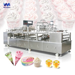 Máquina de llenado y sellado rotativa para yogur, leche, gelato sólido, con tapadora de discos para vasos grandes, botellas, latas y bandejas - Product Image 1