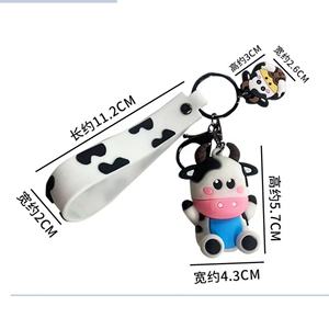 Llavero de vaca de dibujos animados, bonito y sencillo, colgante para coche, accesorio para mochila escolar, regalo promocional - Product Image 1