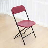 Chaises pliantes d'extérieur avec cadre en acier thermolaqué et assise en plastique blanc/rouge vin/rouge pour mariages et événements
