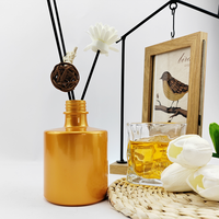 100ml 150ml 250ml Bouteille d'aromathérapie en verre vide Bouteille diffuseur en or avec bouchon en aluminium noir ou couvercle en bois