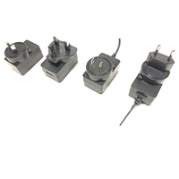 Adaptador de Corriente Desmontable con Clavijas para EE. UU., UE, Reino Unido y Australia, con Cabezales Intercambiables AC/DC