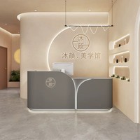 Comptoir d'accueil de luxe moderne pour hôtel, bureau d'information incurvé pour salon de beauté, comptoir éclairé par LED en bois d'ingénierie