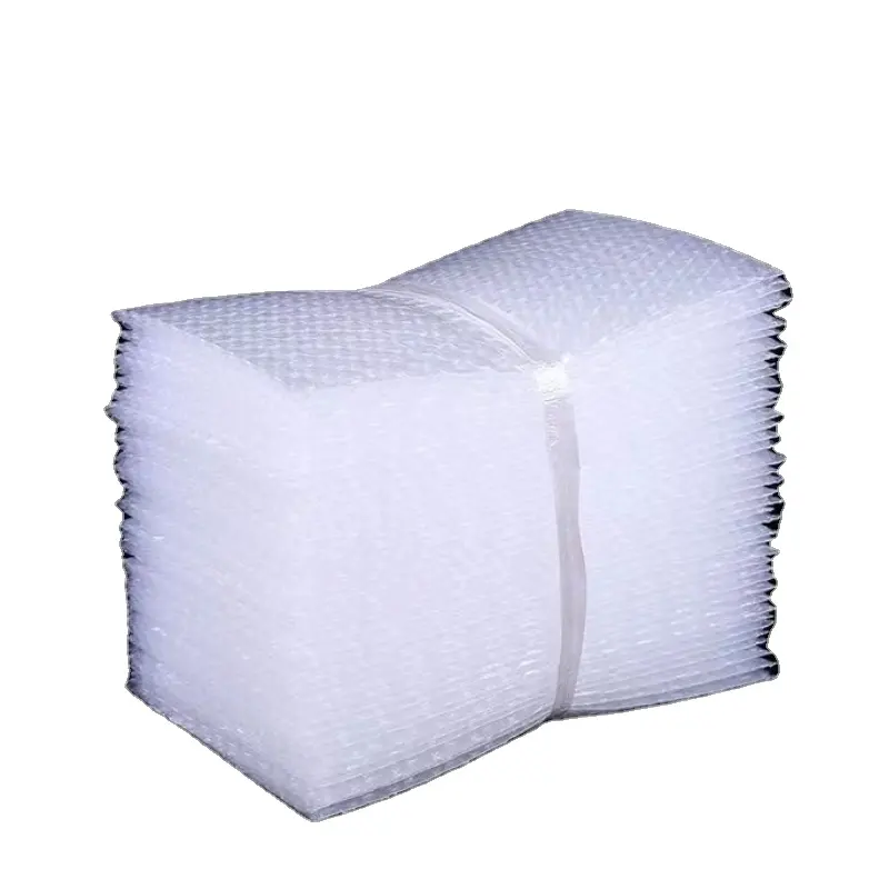 Bolsa de burbujas blanca al por mayor de fábrica, almohadilla de película de embalaje exprés a prueba de golpes gruesa, bolsa de espuma transparente que se puede personalizar