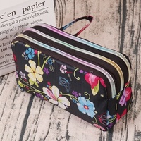 Vente en gros 2024 Portefeuille long pour téléphone portable pour femmes Pochette à motif géométrique Porte-monnaie en tissu