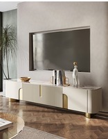 Ensemble de meuble TV et table basse en marbre minimaliste moderne avec cadre en acier inoxydable et bois, couleur crème, avec rangement pour le salon